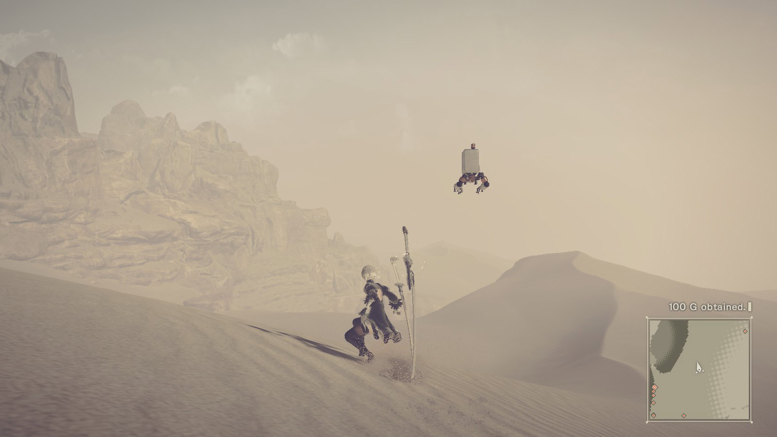 Nier: Automata. The android 2B is sliding down a sand dune.
